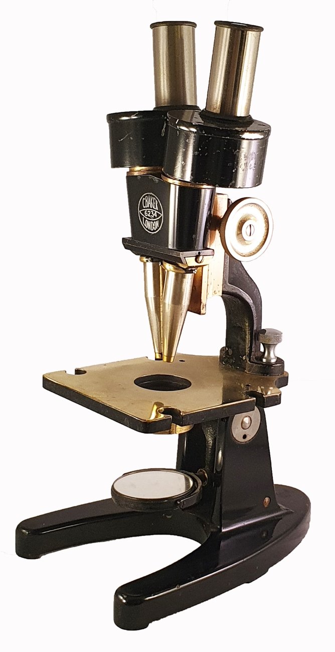 A close-up of a microscopeDescription automatically generated
