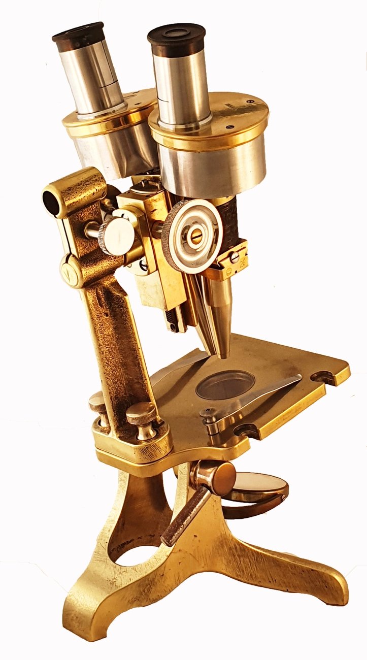 A close-up of a microscopeDescription automatically generated