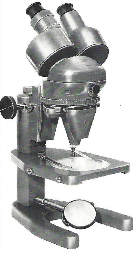 A close-up of a microscopeDescription automatically generated