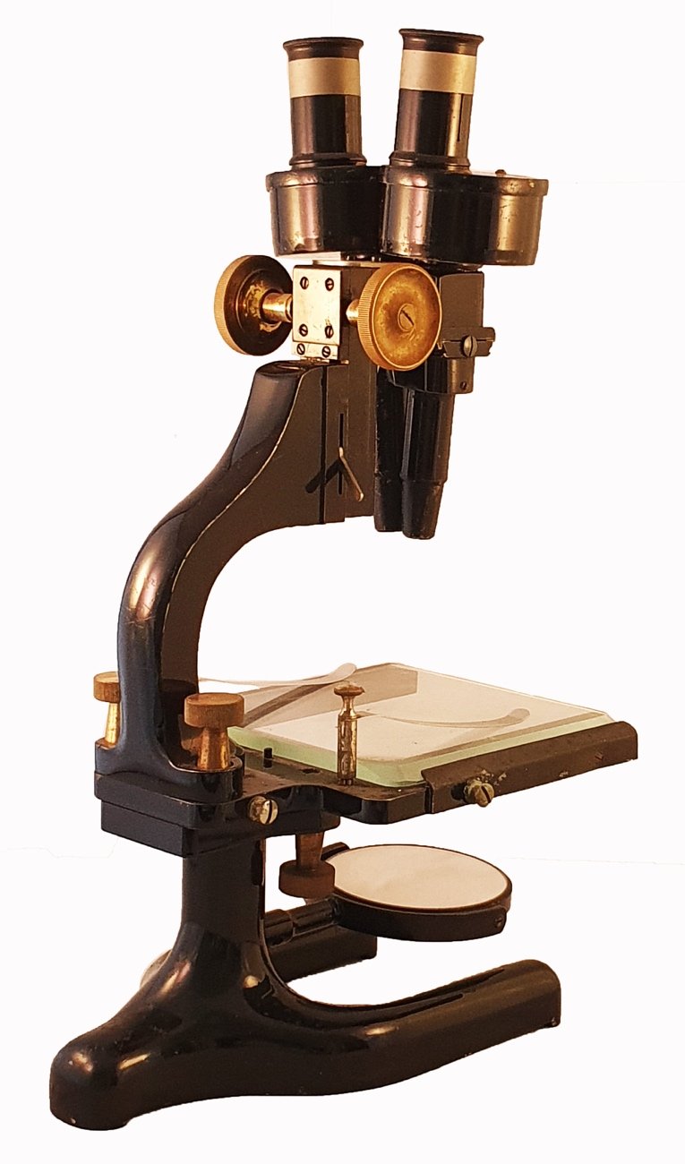 A close-up of a microscopeDescription automatically generated