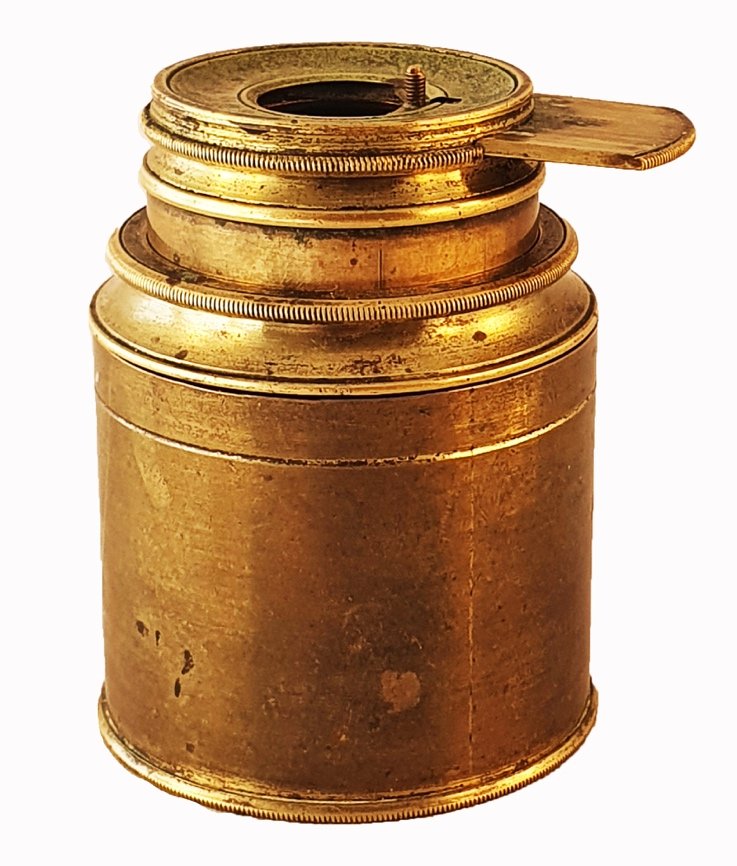 A gold metal container with a handleDescription automatically generated