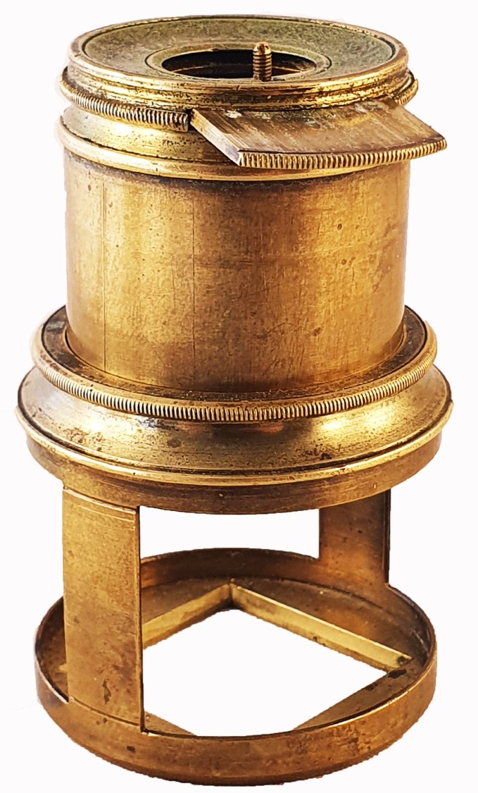 A gold colored metal objectDescription automatically generated with ...