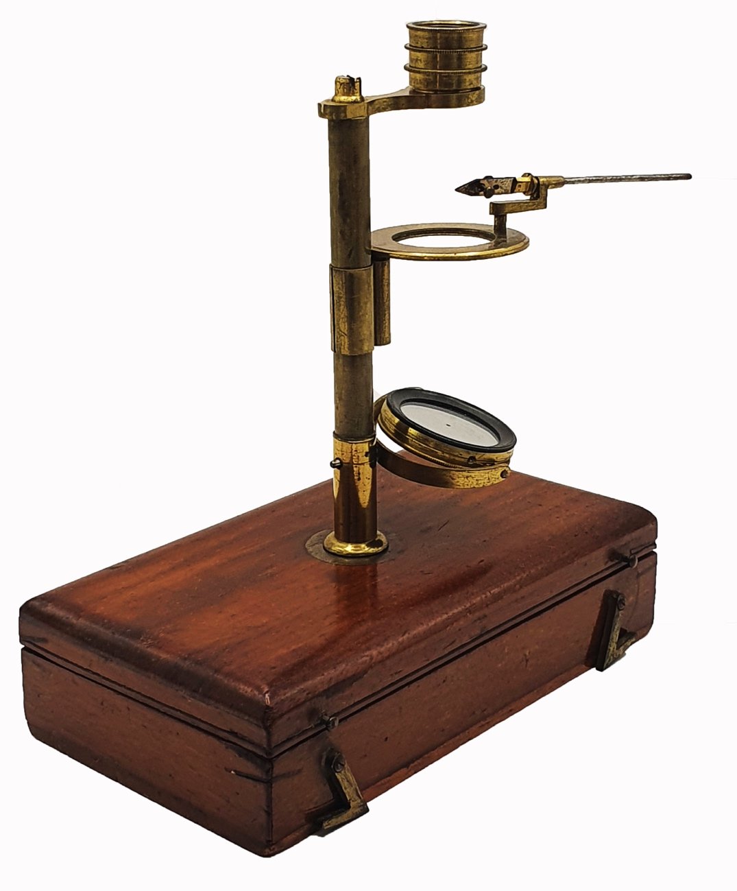 A wooden box with a magnifying glassDescription automatically generated