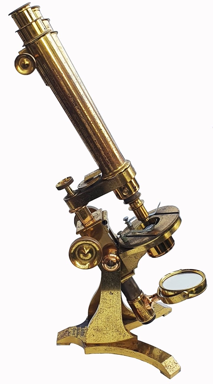 A close-up of a microscopeDescription automatically generated