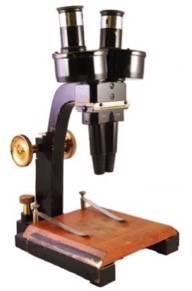 A picture containing table, indoor, sitting, wooden
Description automatically generated