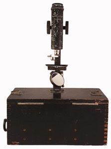 A picture containing sitting, light, street, sign
Description automatically generated