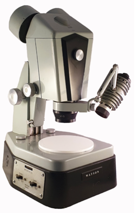 A close-up of a microscope
Description automatically generated