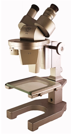 A close-up of a microscope
Description automatically generated