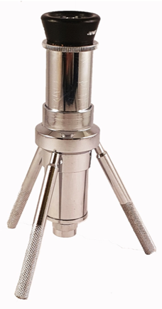 A metal object with three handles
Description automatically generated