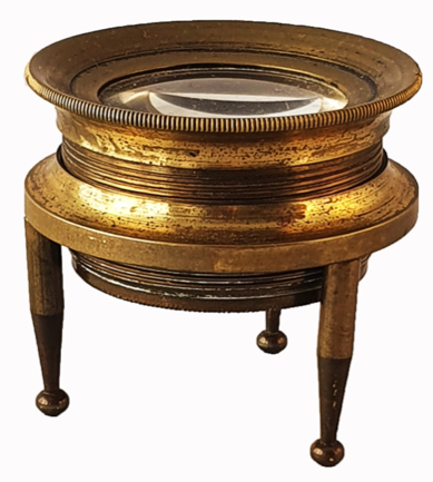 A close up of a magnifying glass
Description automatically generated