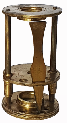 A gold and black metal object
Description automatically generated