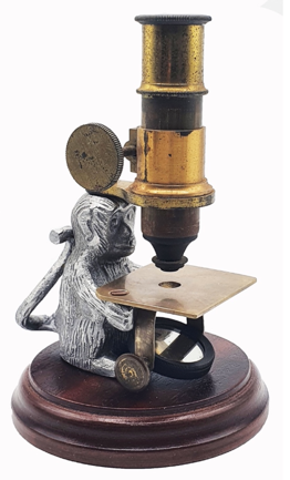 A close-up of a microscope
Description automatically generated