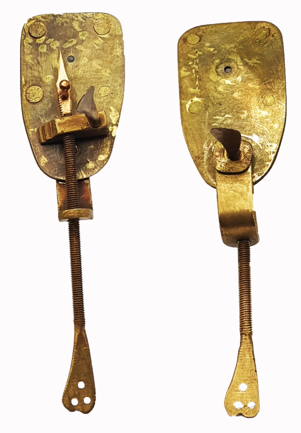 A close-up of a metal device
Description automatically generated