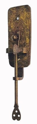 A close-up of a metal piece
Description automatically generated