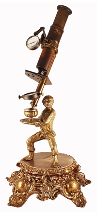 A gold statue of a person holding a microscope
Description automatically generated
