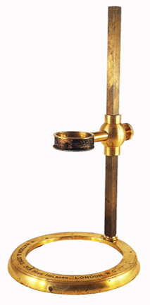 A close-up of a brass candle holder
Description automatically generated