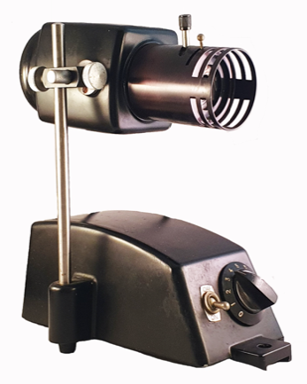 A black machine with a round tube
Description automatically generated